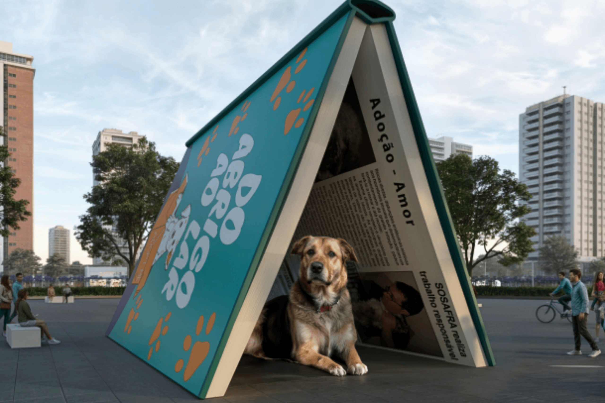 Instalação artística em formato de livro aberto formando um abrigo, com um cachorro deitado em seu interior, em espaço público próximo ao Ibirapuera.
